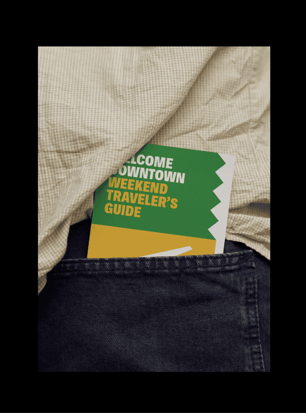 Downtown Traveler’s Guide in Pocket A colorful “Welcome Downtown” weekend guide peeks out of a back pocket.