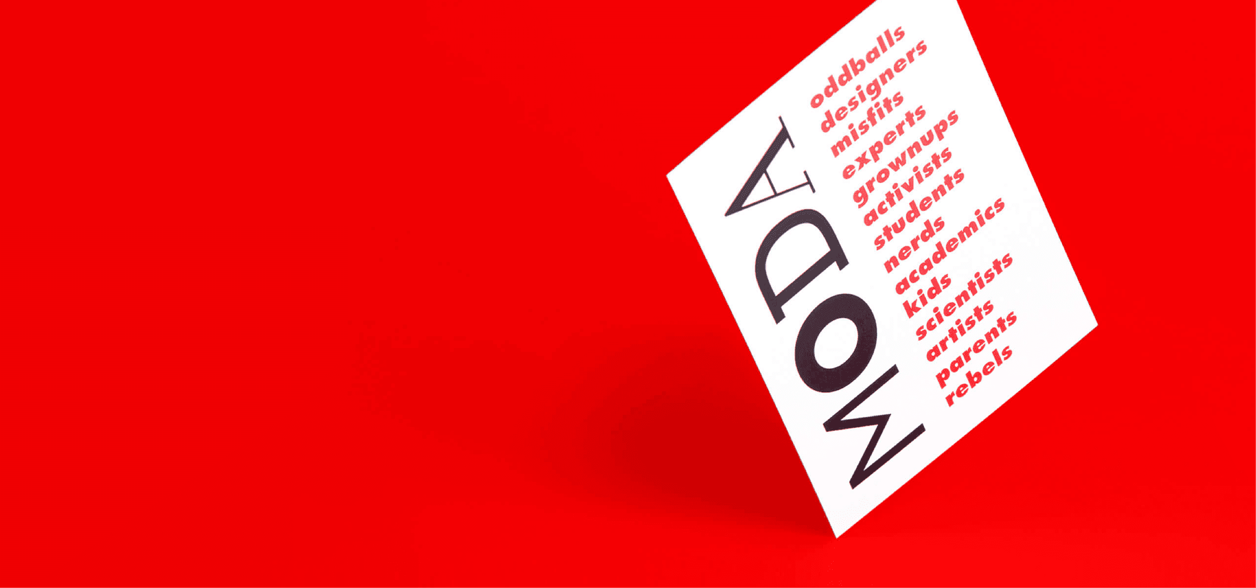A white MODA card leans against a bright red background, listing the many audiences the Museum of Design Atlanta welcomes