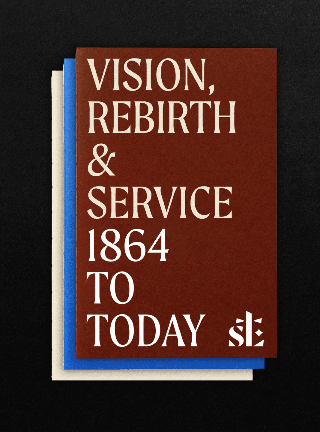 Vision & Service Booklet Stacked St. Luke’s booklets featuring the cover text “Vision, Rebirth & Service 1864 to Today.”